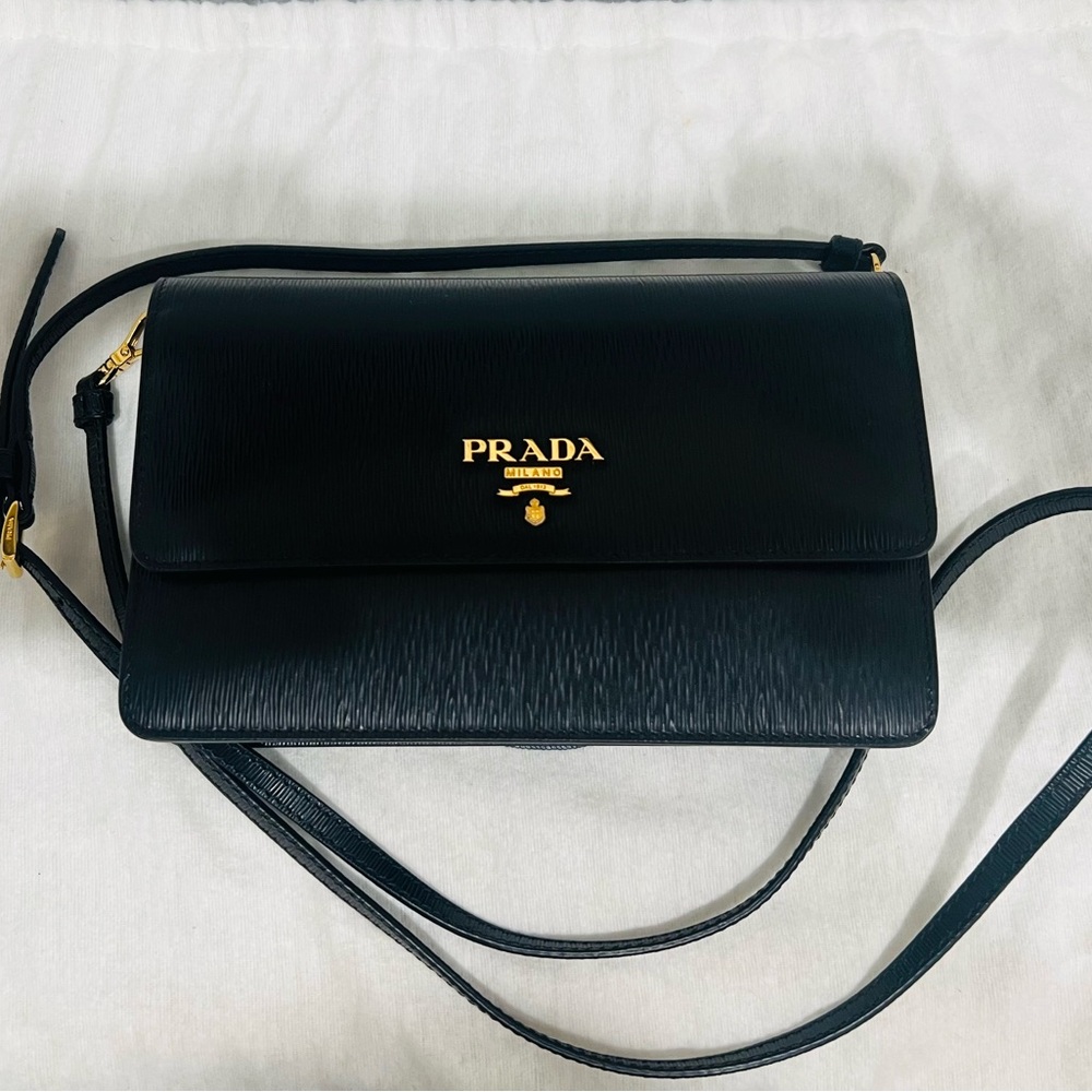 PRADA Saffiano leather black mini bag.
